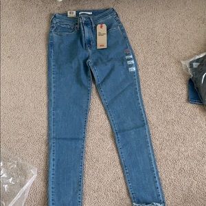 High rise skinny raw hem jeans